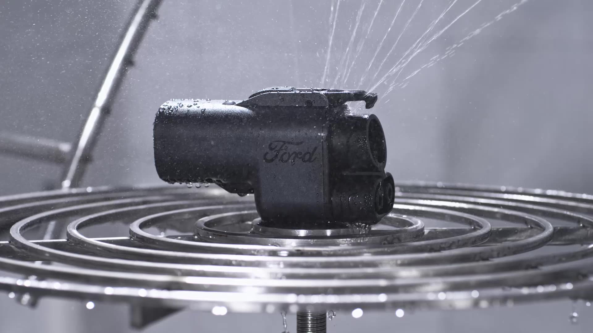 The new Ford Fast Charging Adapter is shown.